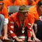 CHAMPAIGN, IL - FEBRUARY 12: Fans of the Illinois Fighting Illini beat on the floor as a member of the Wisconsin Badgers shoots a free-throw on February 12, 2005 at the Assembly Hall at the University of Illinois in Champaign, Illinois. Illinois defeated Wisconsin 70-59. (Photo by Jonathan Daniel/Getty Images)