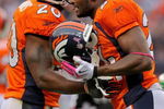 DENVER - OCTOBER 04:  Defensive backs Brian Dawkins #20 and Champ Bailey #24 of the Denver Broncos converse during the final drive by the Dallas Cowboys during NFL action at Invesco Field at Mile High on October 4, 2009 in Denver, Colorado. The Broncos defeated the Cowboys 17-10.  (Photo by Doug Pensinger/Getty Images)