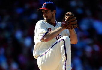 PHILADELPHIA - OCTOBER 07:  Starting pitcher Cliff Lee #34 of the Philadelphia Phillies throws a pitch against the Colorado Rockies in Game One of the NLDS during the 2009 MLB Playoffs at Citizens Bank Park on October 7, 2009 in Philadelphia, Pennsylvania.  (Photo by Jeff Zelevansky/Getty Images)