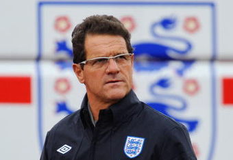 ST ALBANS, ENGLAND - OCTOBER 06: England manager Fabio Capello walks out to the England training session at London Colney on October 6, 2009 in St Albans, England.  (Photo by Michael Regan/Getty Images)
