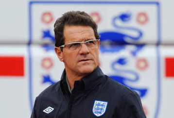 ST ALBANS, ENGLAND - OCTOBER 06: England manager Fabio Capello walks out to the England training session at London Colney on October 6, 2009 in St Albans, England.  (Photo by Michael Regan/Getty Images)