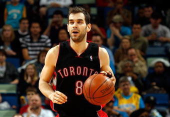 NEW ORLEANS - FEBRUARY 06:  Jose Calderon #8 of the Toronto Raptors dribbles during the game against the New Orleans Hornets on February 6, 2009 in New Orleans, Louisiana.  NOTE TO USER: User expressly acknowledges and agrees that, by downloading and/or using this Photograph, user is consenting to the terms and conditions of the Getty Images License Agreement.  (Photo by Chris Graythen/Getty Images)