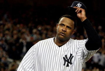 NEW YORK - OCTOBER 07:  Starting pitcher CC Sabathia #52 of the New York Yankees acknowledges the crowd after being pulled out of the game in the seventh inning against the Minnesota Twins in Game One of the ALDS during the 2009 MLB Playoffs at Yankee Stadium on October 7, 2009 in the Bronx borough of New York City.  (Photo by Jim McIsaac/Getty Images)