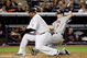 NEW YORK - OCTOBER 07: Joe Mauer #7 of the Minnesota Twins slides into home safely past CC Sabathia #52 of the New York Yankees on a passed ball by Jorge Posada #20 in the third inning of Game One of the ALDS during the 2009 MLB Playoffs at Yankee Stadium on October 7, 2009 in the Bronx borough of New York City. (Photo by Jim McIsaac/Getty Images)