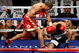 LAS VEGAS - DECEMBER 06:  (L-R) Juan Manuel Lopez of Puerto Rico connects a left to the head of Sergio Medina of Argentina during their WBO junior featherweight title fight at the MGM Grand Garden Arena December 6, 2008 in Las Vegas, Nevada.  (Photo by Ethan Miller/Getty Images)