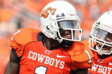 STILLWATER, OK - SEPTEMBER 5:  Wide receiver Dez Bryant #1 of the Oklahoma State Cowboys celebrates his touchdown with teammate Dexter Pratt #22 during the second quarter of the game against the Georgia Bulldogs at Boone Pickens Stadium on September 5, 2009 in Stillwater, Oklahoma. (Photo by Christian Petersen/Getty Images)