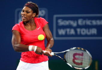 BEIJING - OCTOBER 08:  Serena Williams of USA returns a shot against Nadia Petrova of Russia in her third round match during day seven of the 2009 China Open at the National Tennis Centre on October 8, 2009 in Beijing, China.  (Photo by Feng Li/Getty Images)