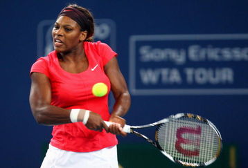 BEIJING - OCTOBER 08:  Serena Williams of USA returns a shot against Nadia Petrova of Russia in her third round match during day seven of the 2009 China Open at the National Tennis Centre on October 8, 2009 in Beijing, China.  (Photo by Feng Li/Getty Images)