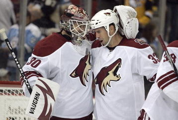 PITTSBURGH, PA - OCTOBER 07: Ilya Bryzgalov #30 celebrates with Adrian Aucoin #33 of the Phoenix Coyotes after posting a 3-0 shutout against the Pittsburgh Penguins at Mellon Arena on October 07, 2009 in Pittsburgh, Pennsylvania.  (Photo by Justin K. Aller/Getty Images)