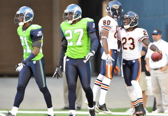 SEATTLE - SEPTEMBER 27:  Wide receiver Devin Hester #23 of the Chicago Bears celebrates with Earl Bennett #80 after scoring a touchdown against Jordan Babineaux #27 and Kelly Jennings #21 of the Seattle Seahawks on September 27, 2009 at Qwest Field in Seattle, Washington. The Bears defeated the Seahawks 25-19. (Photo by Otto Greule Jr/Getty Images)