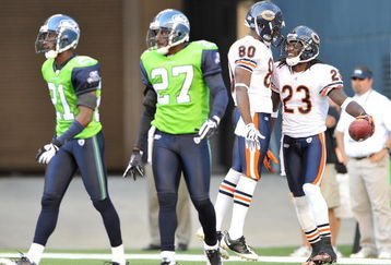 SEATTLE - SEPTEMBER 27:  Wide receiver Devin Hester #23 of the Chicago Bears celebrates with Earl Bennett #80 after scoring a touchdown against Jordan Babineaux #27 and Kelly Jennings #21 of the Seattle Seahawks on September 27, 2009 at Qwest Field in Seattle, Washington. The Bears defeated the Seahawks 25-19. (Photo by Otto Greule Jr/Getty Images)