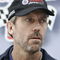 FONTANA, CA - FEBRUARY 22: Actor Hugh Laurie waits to give the command to start engines prior to the NASCAR Sprint Cup Series Auto Club 500 at Auto Club Speedway on February 22, 2009 in Fontana, California. (Photo by Geoff Burke/Getty Images for NASCAR)