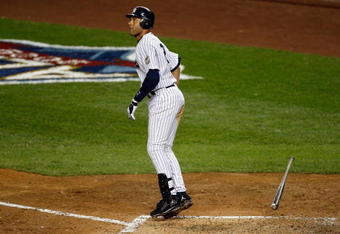 NEW YORK - OCTOBER 07:  Derek Jeter #2 of the New York Yankees hits a two run home run in the third inning against the Minnesota Twins in Game One of the ALDS during the 2009 MLB Playoffs at Yankee Stadium on October 7, 2009 in the Bronx borough of New York City.  (Photo by Jared Wickerham/Getty Images)