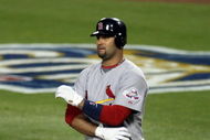 LOS ANGELES, CA - OCTOBER 07:  Albert Pujols #5 of the St. Louis Cardinals looks on against the Los Angeles Dodgers in Game One of the NLDS during the 2009 MLB Playoffs at Dodger Stadium on October 7, 2009 in Los Angeles, California.  (Photo by Stephen Dunn/Getty Images)