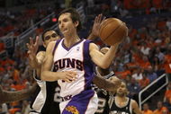 PHOENIX - APRIL 25: Steve Nash #13 of the Phoenix Suns is defended by Tim Duncan #21 of the San Antonio Spurs during Game Three of the Western Conference Quarterfinals during the 2008 at NBA Playoffs at the at U.S. Airways Center on April 25, 2008. (Photo by Jed Jacobsohn/Getty Images)