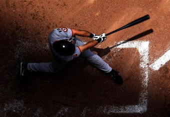 MILWAUKEE - JULY 22:  Rich Aurilia #35 of the San Francisco Giants connects with the ball during the game against the Milwaukee Brewers at Miller Park July 22, 2007 in Milwaukee, Wisconsin.  (Photo by Jamie Squire/Getty Images)