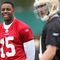 SANTA CLARA, CA - MAY 01:  Michael Crabtree #15 of the San Francisco 49ers looks on during practice as quaterback Alex Smith #11 practices during the 49ers Minicamp at their training facilities on May 1, 2009 in Santa Clara, California. Crabtree was the 49ers first round draft pick.  (Photo by Jed Jacobsohn/Getty Images)