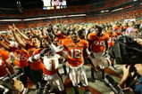 FORT LAUDERDALE, FL - OCTOBER 03: Quarterback Jacory Harris #12 of the Miami Hurricanes celebrates with teammates after a victory over the Oklahoma Sooners at Land Shark Stadium on October 3, 2009 in Fort Lauderdale, Florida. Miami defeated Oklahoma 21-20. (Photo by Doug Benc/Getty Images)