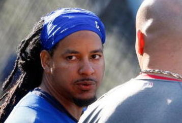 LOS ANGELES, CA - OCTOBER 07:  Manny Ramirez #99 of the Los Angeles Dodgers talks with Albert Pujols #5 of the St. Louis Cardinals before Game One of the NLDS during the 2009 MLB Playoffs at Dodger Stadium on October 7, 2009 in Los Angeles, California.  (Photo by Jeff Gross/Getty Images)
