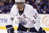 VANCOUVER, CANADA - SEPTEMBER 19: Ethan Moreau #18 of the Edmonton Oilers looks on during a stoppage in play in a preseason game against the Vancouver Canucks on September 19, 2009 at General Motors Place in Vancouver, British Columbia, Canada.  (Photo by Rich Lam/Getty Images)