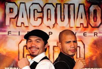BEVERLY HILLS, CA - SEPTEMBER 14:  Manny Pacquiao and  Miguel Cotto pose for pictures during the press conference at the Beverly Hills Hotel on September 14, 2009 in Beverly Hills, California.  (Photo by Jacob de Golish/Getty Images)