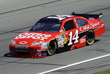 KANSAS CITY, KS - OCTOBER 02:  Tony Stewart, driver of the #14 Office Depot/Old Spice Chevrolet, drives during practice for the NASCAR Sprint Cup Series Price Chopper 400 presented by Kraft Foods at the Kansas Speedway on October 2, 2009 in Kansas City, Kansas.  (Photo by John Harrelson/Getty Images for NASCAR)