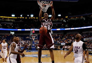 TAMPA, FL - MARCH 14:  Jarvis Varnado #32 of the Mississippi State Bulldogs dunks the ball around Quintin Thornton #32 of the Louisiana State University Tigers during the Semifinal round of the SEC Men's Basketball Tournament on March 14, 2009 at The St. Pete Times Forum in Tampa, Florida.  (Photo by Chris Graythen/Getty Images)