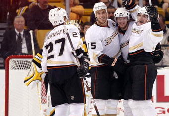 BOSTON - OCTOBER 08:  Bobby Ryan #9 of the Anaheim Ducks celebrates his goal with teammates Ryan Getzlaf #15, Corey Perry #10 and Scott Niedermayer #27 in the third period against the Boston Bruins on October 8, 2009 at the TD Garden in Boston, Massachusetts. The Ducks defeated the Bruins 6-1.  (Photo by Elsa/Getty Images)