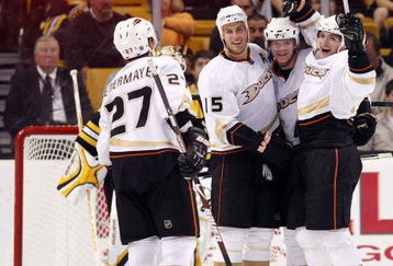 BOSTON - OCTOBER 08:  Bobby Ryan #9 of the Anaheim Ducks celebrates his goal with teammates Ryan Getzlaf #15, Corey Perry #10 and Scott Niedermayer #27 in the third period against the Boston Bruins on October 8, 2009 at the TD Garden in Boston, Massachusetts. The Ducks defeated the Bruins 6-1.  (Photo by Elsa/Getty Images)
