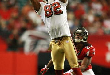 ATLANTA - NOVEMBER 04:  Wide receiver Darrell Jackson #82 of the San Francisco 49ers hauls in a catch in front of cornerback Chris Houston #23 of the Atlanta Falcons at Georgia Dome on November 4, 2007 in Atlanta, Georgia.The Falcons defeated the 49ers 20-16.  (Photo by Doug Benc/Getty Images)