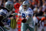 DENVER - OCTOBER 04:  Quarterback Tony Romo #9 of the Dallas Cowboys hands off to running back Marion Barber #24 against the Denver Broncos during NFL action at Invesco Field at Mile High on October 4, 2009 in Denver, Colorado. The Broncos defeated the Cowboys 17-10.  (Photo by Doug Pensinger/Getty Images)