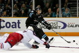 SAN JOSE, CA - OCTOBER 08:  Dany Heatley #15 of the San Jose Sharks shoots and scores past diving defenders from the Columbus Blue Jackets in the second period at HP Pavilion on October 8, 2009 in San Jose, California.  (Photo by Ezra Shaw/Getty Images)