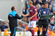 BLACKBURN, ENGLAND - AUGUST 29:  West Ham manager Gianfranco Zola subs Jack Collison during the second of the Barclays Premier League match between Blackburn Rovers and West Ham United at Ewood Park on August 29, 2009 in Blackburn, England.  (Photo by Michael Regan/Getty Images)