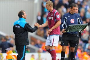 BLACKBURN, ENGLAND - AUGUST 29: West Ham manager Gianfranco Zola subs Jack Collison during the second of the Barclays Premier League match between Blackburn Rovers and West Ham United at Ewood Park on August 29, 2009 in Blackburn, England. (Photo by Michael Regan/Getty Images)