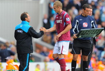 BLACKBURN, ENGLAND - AUGUST 29:  West Ham manager Gianfranco Zola subs Jack Collison during the second of the Barclays Premier League match between Blackburn Rovers and West Ham United at Ewood Park on August 29, 2009 in Blackburn, England.  (Photo by Michael Regan/Getty Images)