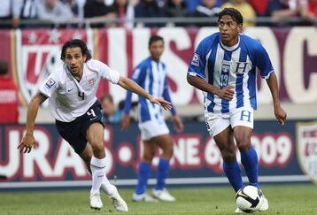 CHICAGO - JUNE 06: Carlos Costly #13 of Honduras controls the ball as Pablo Mastroeni #4 of the United States defends during a FIFA 2010 World Cup Qualifying match on June 6, 2009 at Soldier Field in Chicago, Illinois. The United States defeated Honduras 2-1. (Photo by Jonathan Daniel/Getty Images)