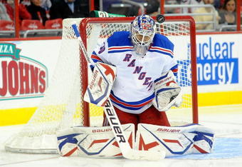 WASHINGTON - OCTOBER 08:  Henrik Lundqvist #30 of the New York Rangers makes a save against the Washington Capitals at the Verizon Center on October 8, 2009 in Washington, DC.  (Photo by Greg Fiume/Getty Images)