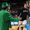 DENVER - MARCH 20: Luke Harangody #44 of the Notre Dame Fighting Irish is greeted by the team mastcot during introductions to the first round game of the East Regional against the George Mason Patriots as part of the 2008 NCAA Men's Basketball Tournament at Pepsi Center on March 20, 2008 in Denver, Colorado. The Fighting Irish defeated the Patriots 68-50. (Photo by Doug Pensinger/Getty Images)