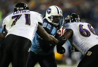 NASHVILLE, TN - JANUARY 10:  (M) Defensive tackle Albert Haynesworth #93 of the Tennessee Titans is double-teammed by lineman Jared Gaither #71 and Ben Grubbs #66 of the Baltimore Ravens during the AFC Divisional Playoff Game on January 10, 2009 at LP Field in Nashville, Tennessee.  (Photo by Jonathan Daniel/Getty Images)