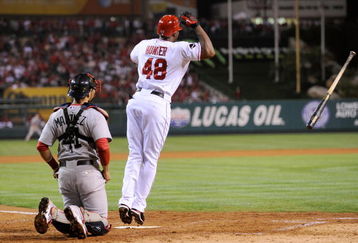 ANAHEIM, CA - OCTOBER 08:  Torii Hunter #48 of the Los Angeles Angels of Anaheim reacts to hitting a three-run home run as catcher Victor Martinez #41 of the Boston Red Sox look on in the fifth inning of Game One of the ALDS during the 2009 MLB Playoffs at Angel Stadium on October 8, 2009 in Anaheim, California.  (Photo by Kevork Djansezian/Getty Images)