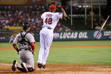 ANAHEIM, CA - OCTOBER 08:  Torii Hunter #48 of the Los Angeles Angels of Anaheim reacts to hitting a three-run home run as catcher Victor Martinez #41 of the Boston Red Sox look on in the fifth inning of Game One of the ALDS during the 2009 MLB Playoffs at Angel Stadium on October 8, 2009 in Anaheim, California.  (Photo by Kevork Djansezian/Getty Images)