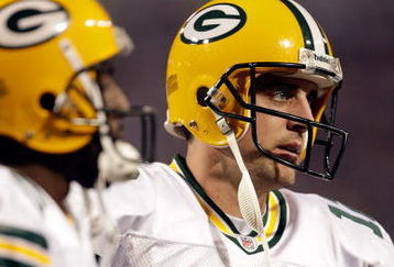 MINNEAPOLIS - OCTOBER 05:  Quarterback Aaron Rodgers #12 of the Green Bay Packers walks off the field during the Monday Night Football game against the Minnesota Vikings on October 5, 2009 at Hubert H. Humphrey Metrodome in Minneapolis, Minnesota.  (Photo by Jamie Squire/Getty Images)