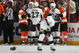 PHILADELPHIA - OCTOBER 08: Kris Letang #58 of the Pittsburgh Penguins leaves the ice after being injured in a third period skirmish against the Philadelphia Flyers at the Wachovia Center on October 8, 2009 in Philadelphia, Pennsylvania. The Penguins defetaed the Flyers 5-4. (Photo by Bruce Bennett/Getty Images)