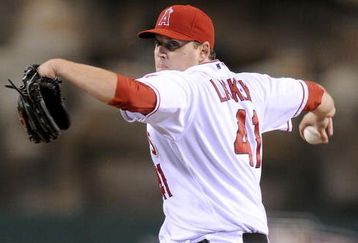 ANAHEIM, CA - OCTOBER 08:  Starting pitcher John Lackey #41 of the Los Angeles Angels of Anaheim delivers a pitch against the Boston Red Sox during Game One of the ALDS during the 2009 MLB Playoffs at Angel Stadium on October 8, 2009 in Anaheim, California.  (Photo by Lisa Blumenfeld/Getty Images)
