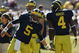 ANN ARBOR, MI - SEPTEMBER 19: Quarterback Tate Forcier #5 of the Michigan Wolverines greets running back Brandon Minor #4 during warmups for the game against the Eastern Michigan Eagles at Michigan Stadium on September 19, 2009 in Ann Arbor, Michigan. Michigan won 45-17. (Photo by Stephen Dunn/Getty Images)