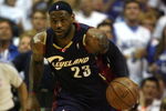 ORLANDO, FL - MAY 30:  LeBron James #23 of the Cleveland Cavaliers handles the ball against the Orlando Magic in Game Six of the Eastern Conference Finals during the 2009 Playoffs at Amway Arena on May 30, 2009 in Orlando, Florida. NOTE TO USER: User expressly acknowledges and agrees that, by downloading and or using this photograph, User is consenting to the terms and conditions of the Getty Images License Agreement  (Photo by Elsa/Getty Images)