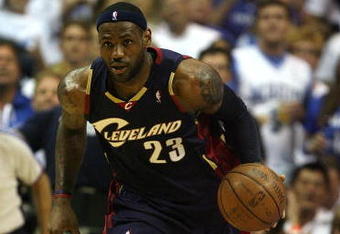 ORLANDO, FL - MAY 30:  LeBron James #23 of the Cleveland Cavaliers handles the ball against the Orlando Magic in Game Six of the Eastern Conference Finals during the 2009 Playoffs at Amway Arena on May 30, 2009 in Orlando, Florida. NOTE TO USER: User expressly acknowledges and agrees that, by downloading and or using this photograph, User is consenting to the terms and conditions of the Getty Images License Agreement  (Photo by Elsa/Getty Images)