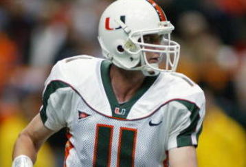 SYRACUSE, NY - NOVEMBER 30:  Quarterback Ken Dorsey #11 of the University of Miami looks to pass during the game against Syracuse University at the Carrier Dome on November 30, 2002 in Syracuse, New York. Miami won 49 to 7.  (Photo by Rick Stewart/Getty Images)