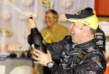 FONTANA, CA - FEBRUARY 22:  Matt Kenseth, driver of the #17 Carhartt Ford, celebrates in victory lane after winning the NASCAR Sprint Cup Series Auto Club 500 at Auto Club Speedway on February 22, 2009 in Fontana, California.  (Photo by Rusty Jarrett/Getty Images for NASCAR)