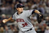 NEW YORK - OCTOBER 09:  Joe Nathan #36 of the Minnesota Twins pitches against the New York Yankees in Game Two of the ALDS during the 2009 MLB Playoffs at Yankee Stadium on October 9, 2009 in the Bronx borough of New York City.  (Photo by Jim McIsaac/Getty Images)